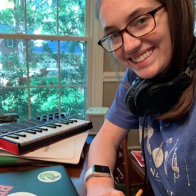 student at her at home desk