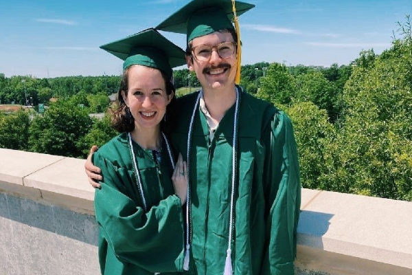 photo of recent graduate in cap and gown 