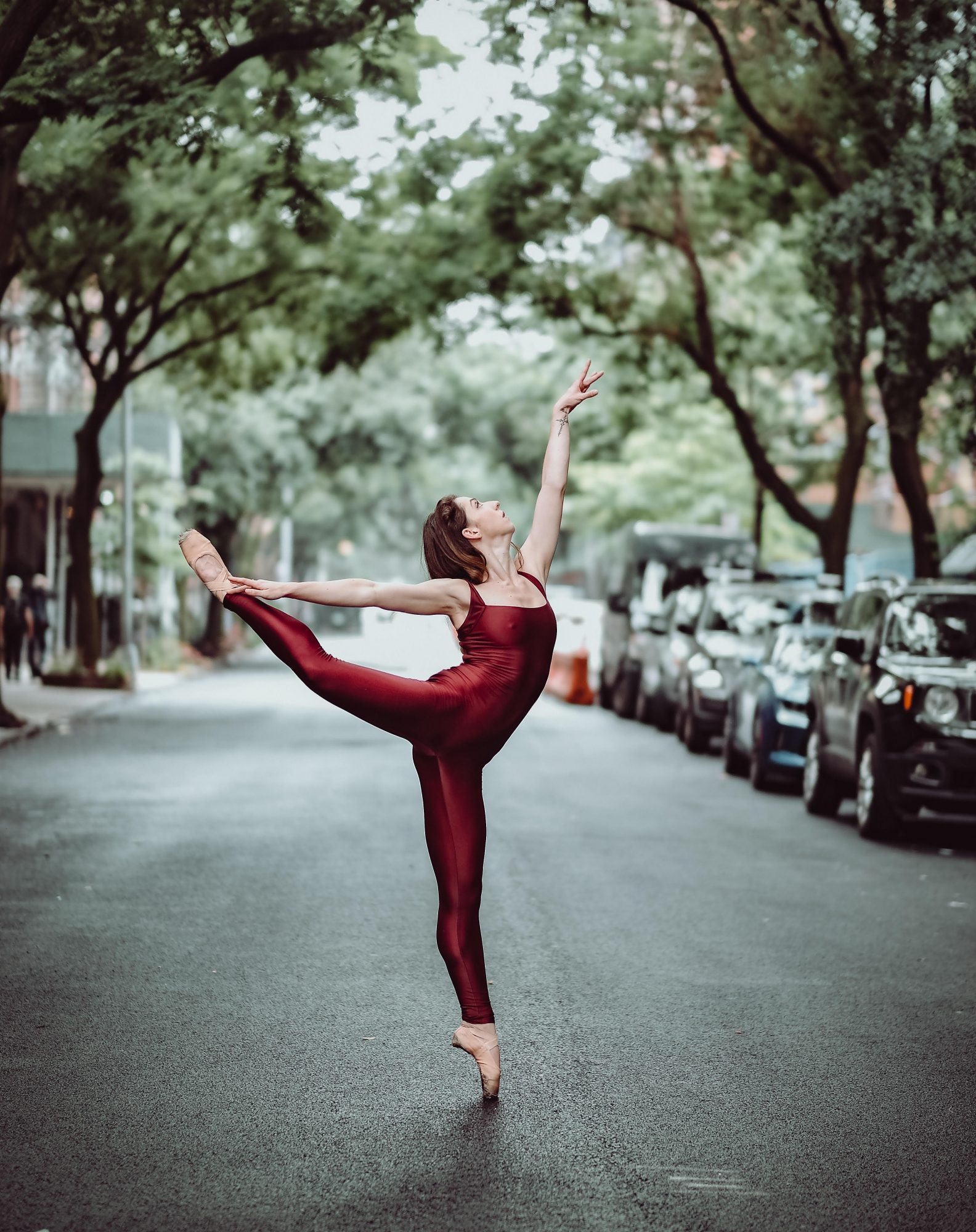 Laura Dearman in a red unitard in the streets of NYC