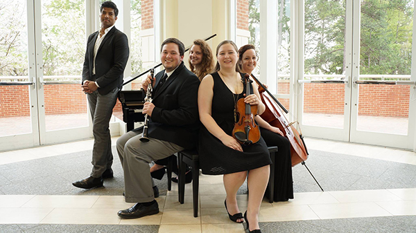 Dr. Govias with student quartet